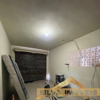 Casa em ponto comercial