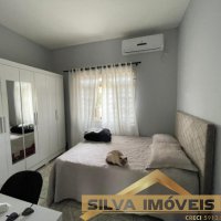 CASA COM AMPLO ESPA�O EXTERNO.