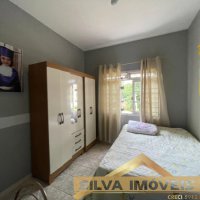 CASA COM AMPLO ESPA�O EXTERNO.