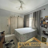 CASA COM AMPLO ESPA�O EXTERNO.
