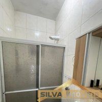 CASA COM AMPLO ESPA�O EXTERNO.