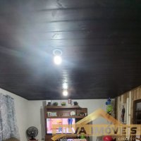 CASA NO TIMB�