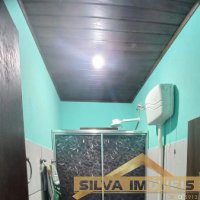CASA NO TIMB�