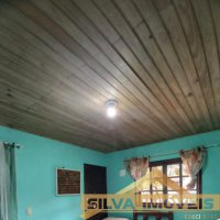 CASA NO TIMB�